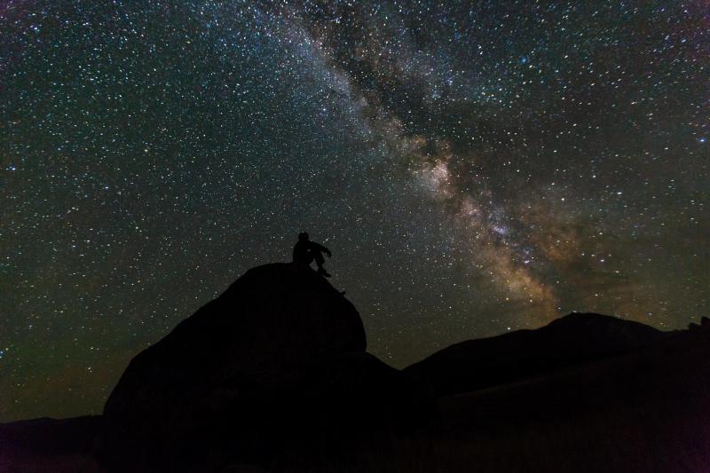 Silhouette against a night sky