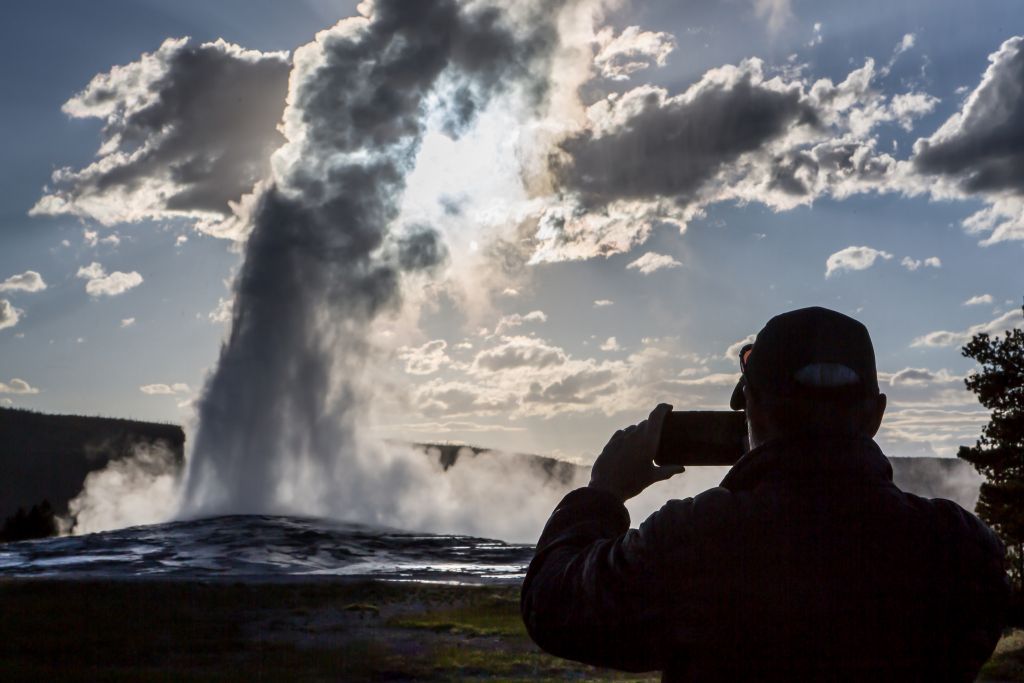Photographing Old Faithful at Sunset