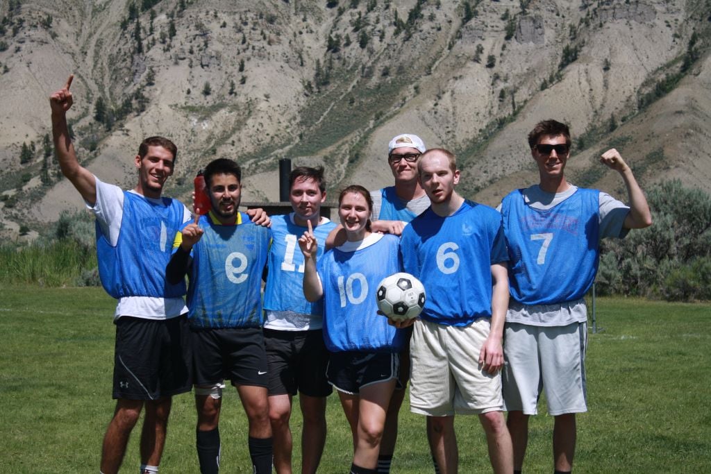 employees playing soccer