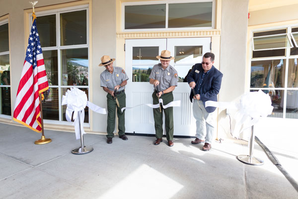 Cam Sholly and Mike Keller Cut the Ribbon to Officially open the renovated Mammoth Hot Springs Hotel