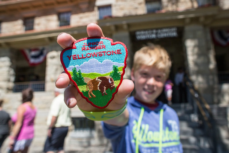 A junior ranger outside the Albright Visitor Center