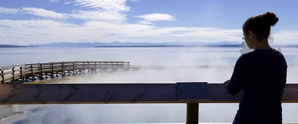Visitor at Black Pool at West Thumb Geyser Basin