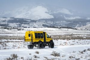 Snowcoach driving swan lake flats