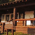 Roosevelt Lodge sign in front of porch