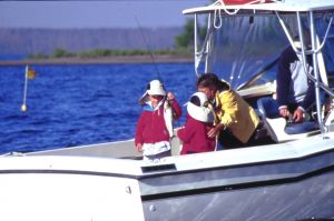 Family on guided fishing boat tour