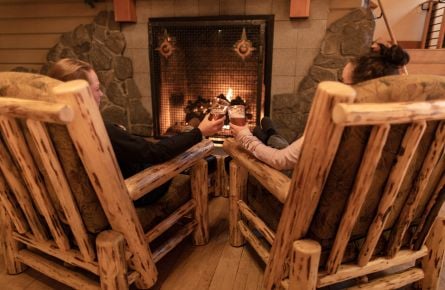 Drinks by the fire at Old Faithful Snow Lodge