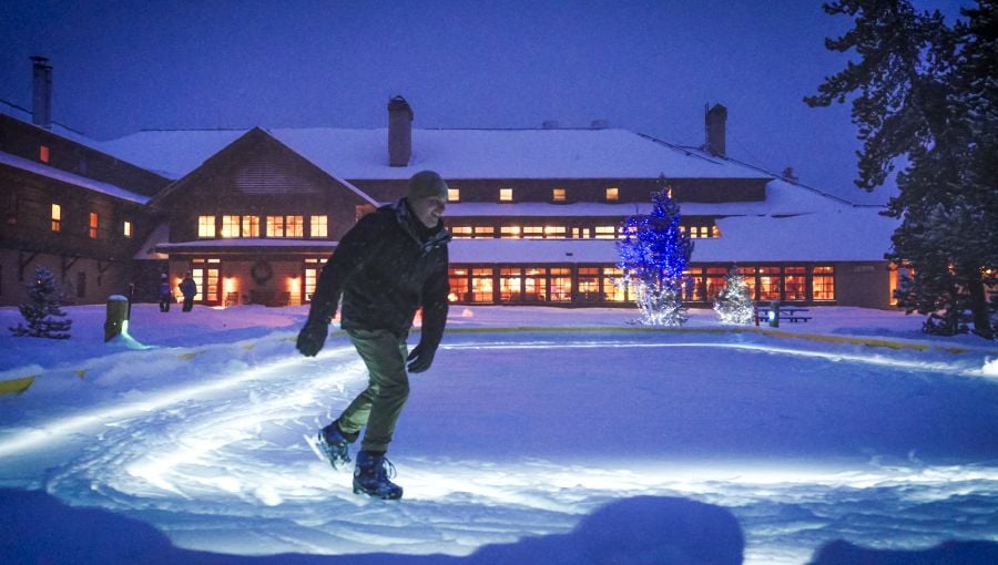 Man skating at Old Faithful Snow Lodge