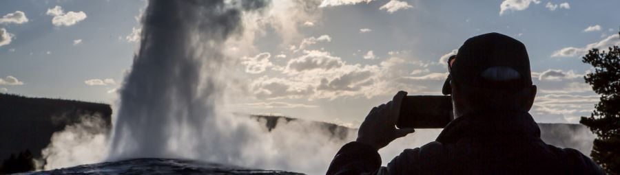 Photographing Old Faithful at Sunset