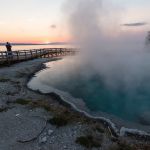 Photographing the sunrise at West Thumb Geyser Basin
