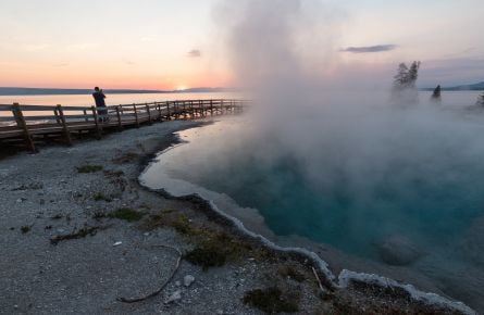 Photographing the sunrise at West Thumb Geyser Basin