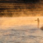 Fall fishing on the Madison River at sunrise