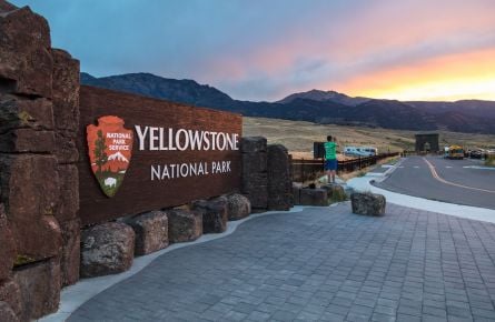 Sunset in Gardiner near the Park Entrance sign
