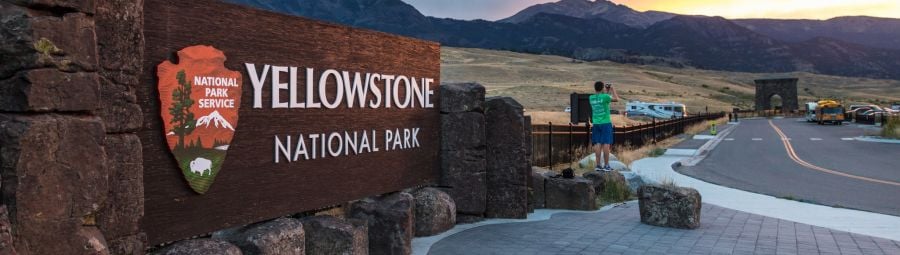 Sunset in Gardiner near the Park Entrance sign