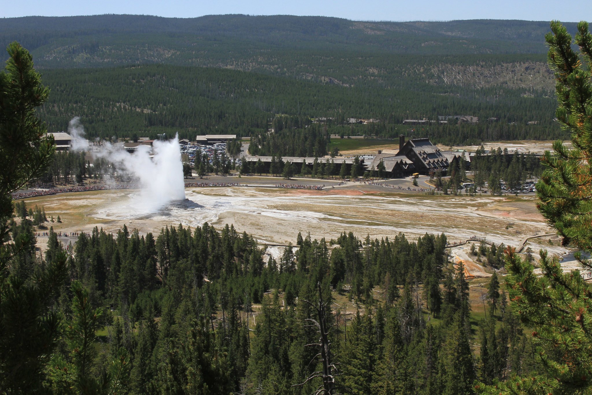 Visitors-watching-Old-Faithful-Geyser-with-OFI-and-OFVEC-in-background.jpg