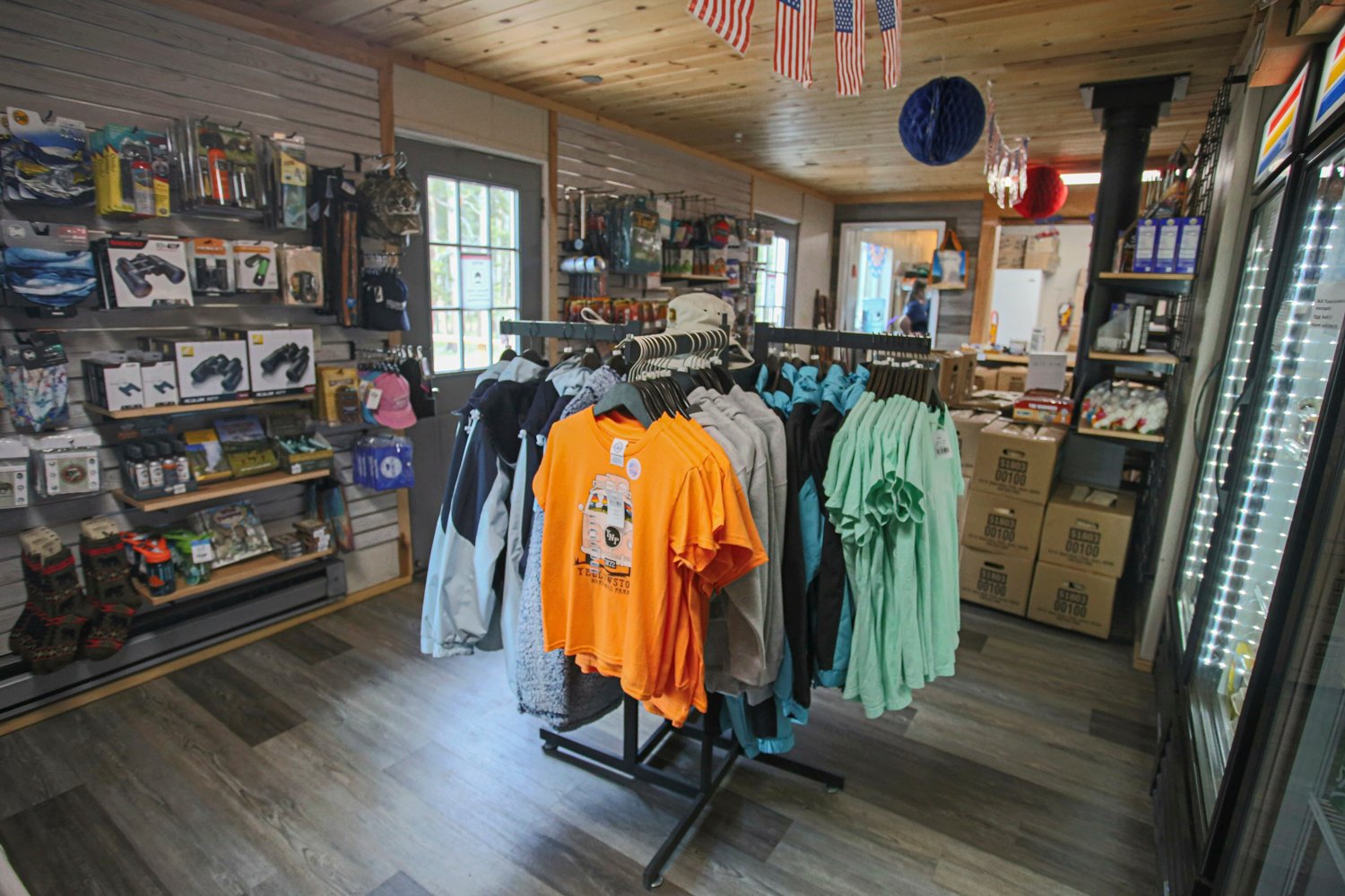 T-shirts and camping supplies at Madison Mercantile