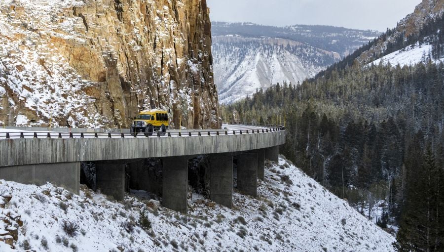 Snowcoach driving through golden gate canyon