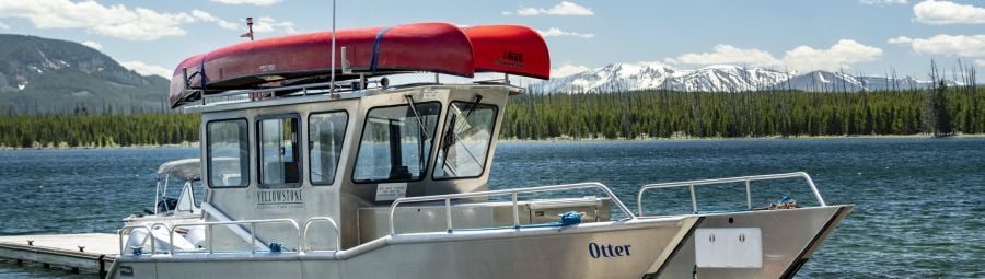 shuttle boat with canoes