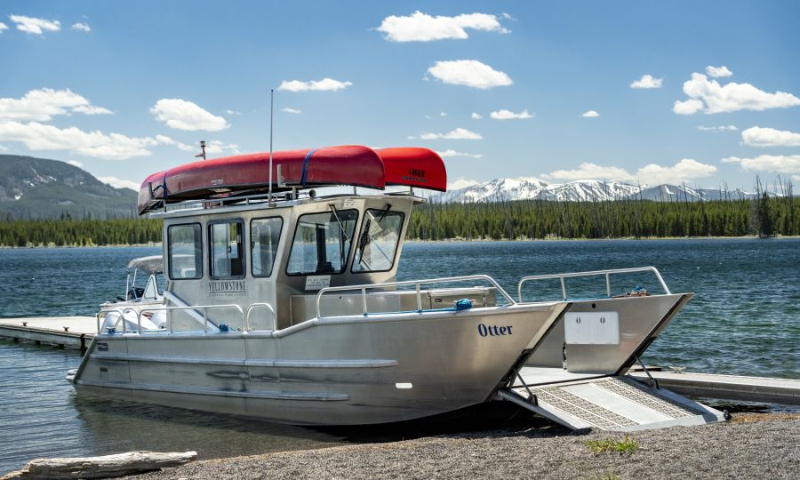 shuttle boat with canoes