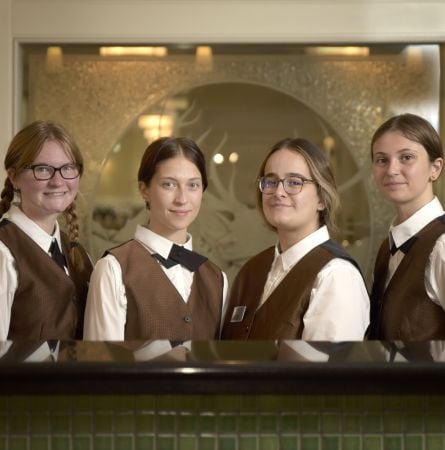 Employees at the Lake Yellowstone Hotel front desk